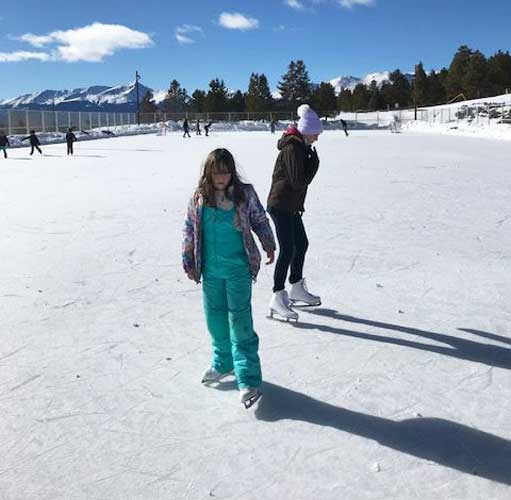 The author's kids having fun in ice skating