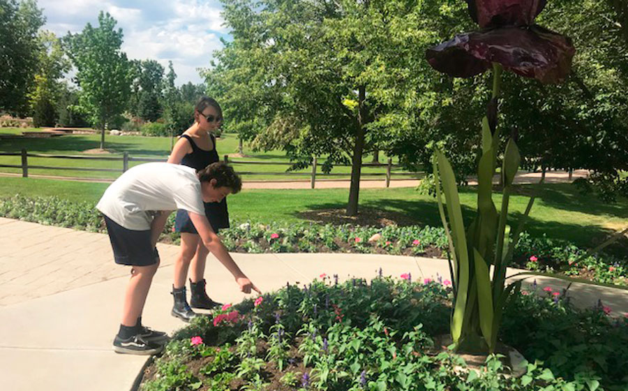 The author's kids admiring the flowers in Hudson Gardens