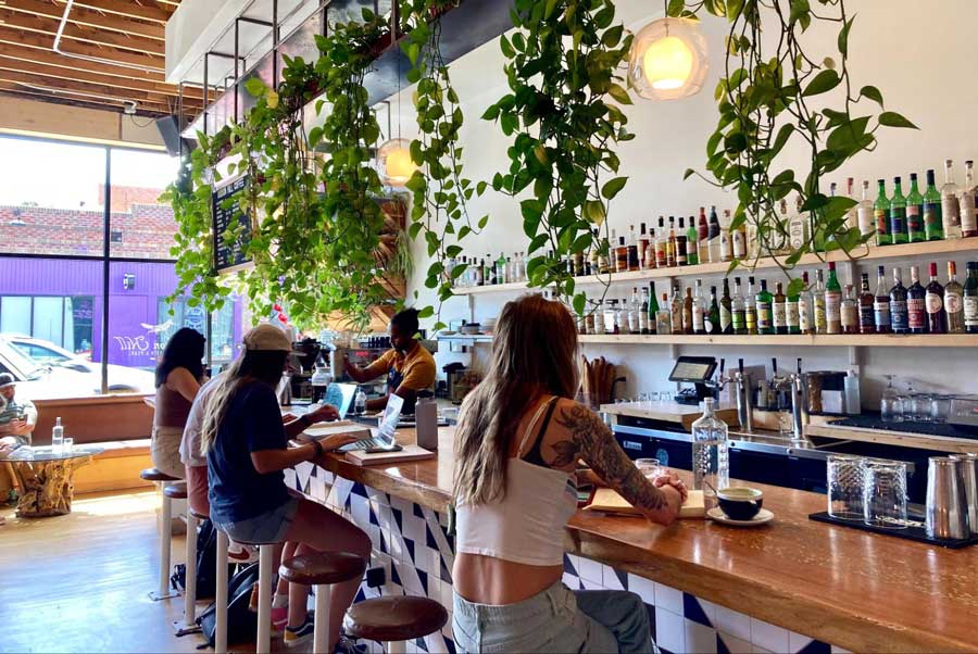 People enjoying their drinks inside Hudson Hill