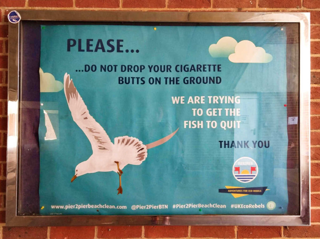 A humorous framed poster on the wall