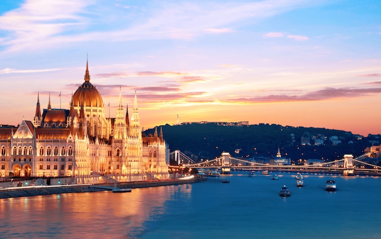 Picturesque City landscape of the Parliament and the bridge over the Danube in Budapest at sunset