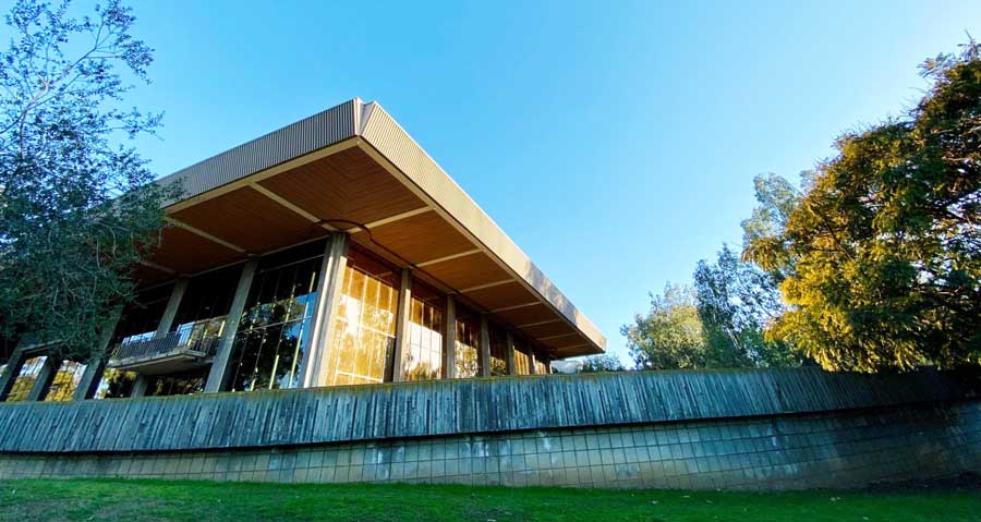 The Huntington Beach Central Library Theatre under the clear blue sky