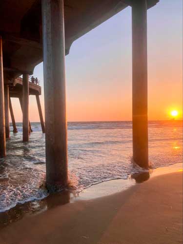 View of the colorful sunset over the Huntington State Beach