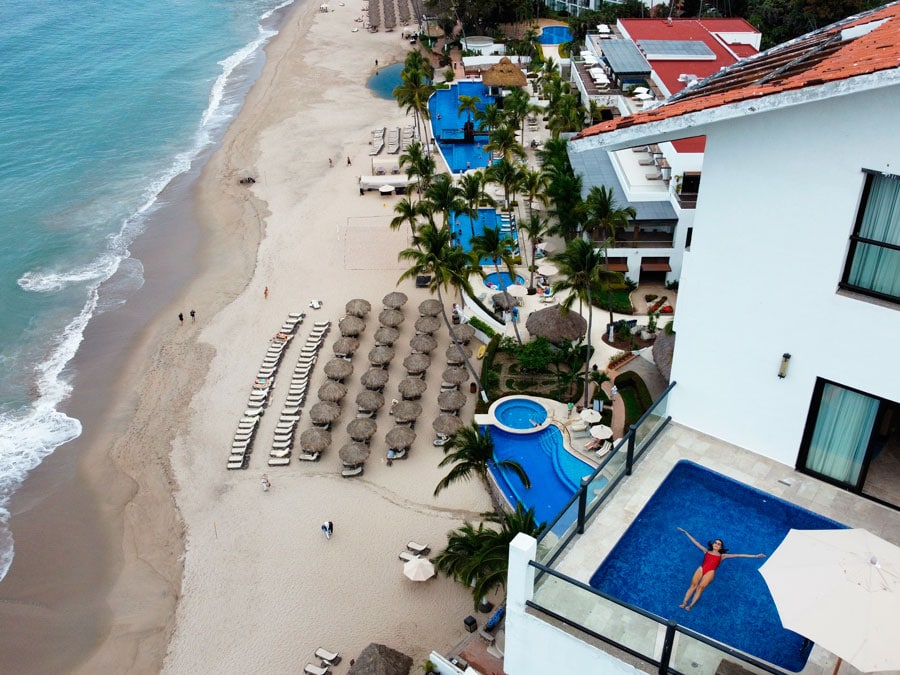 Clara on a pool in an aerial shot in Hyatt Ziva