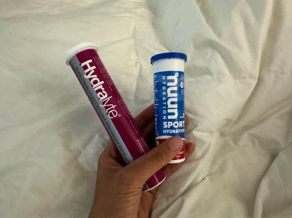The author, holding hydration tablets