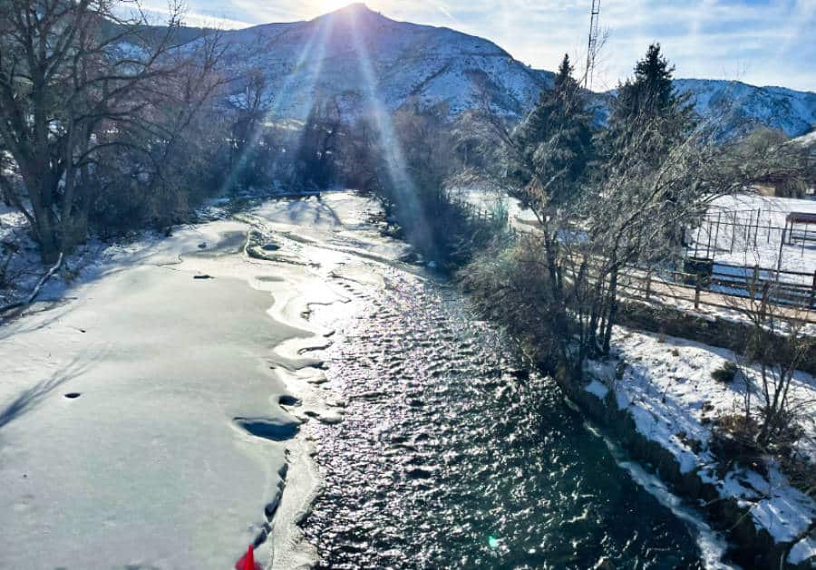 Aerial view of the melting iced water of the river