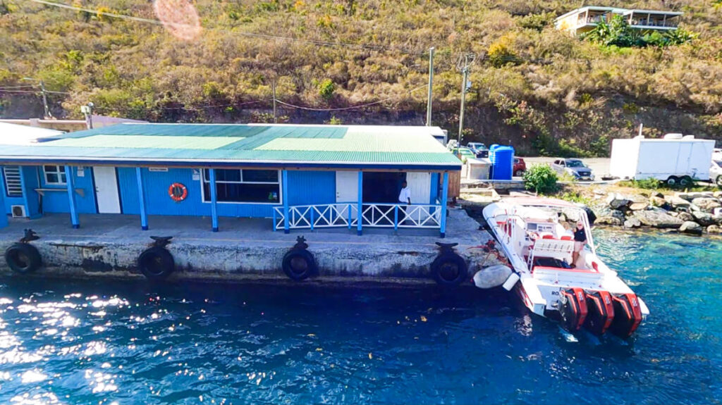 A private water taxi docked at the immigration office in Tortola