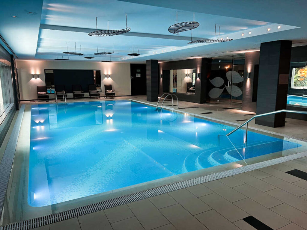 View of the indoor pool and sauna at The Westin