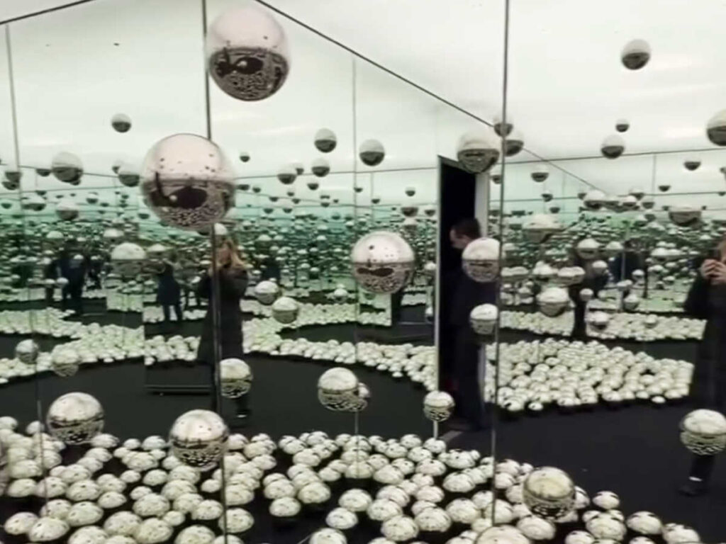 View inside the Infinity Rooms exhibit by Yayoi Kusama