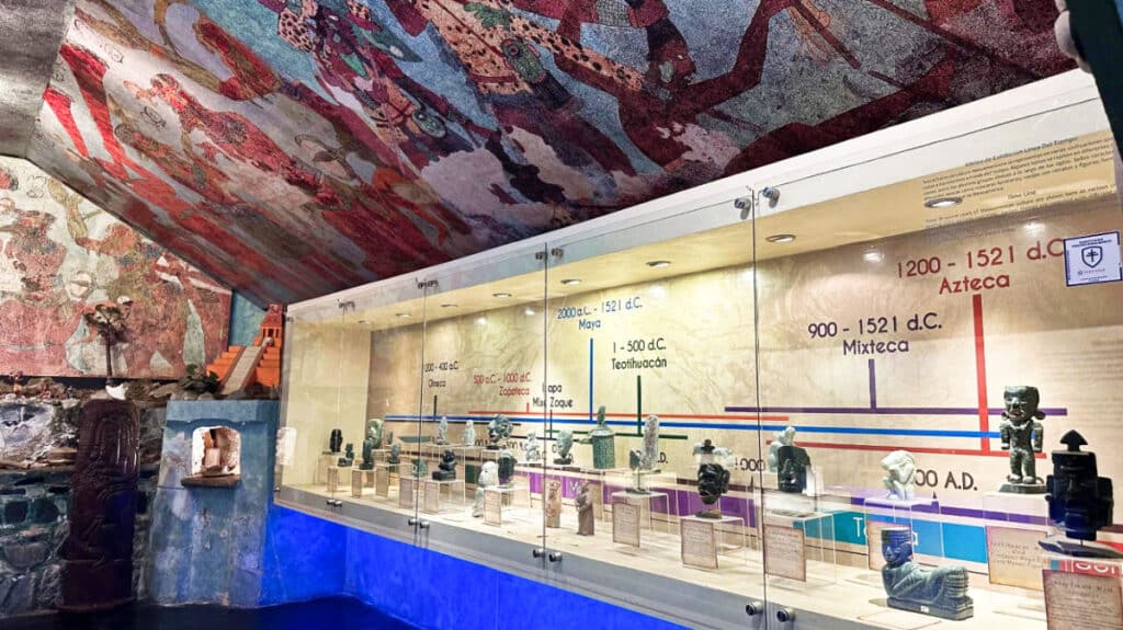 View of the mural on the ceiling and the Jade artifacts inside Jade Maya Museum