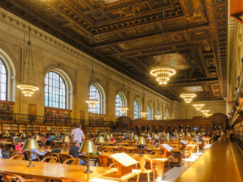 View of people reading inside New York Public Library