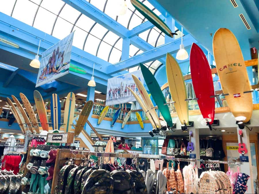 View of the surfboards, backpacks and other merchandise inside Ron Jon Surf Shop & Surf School