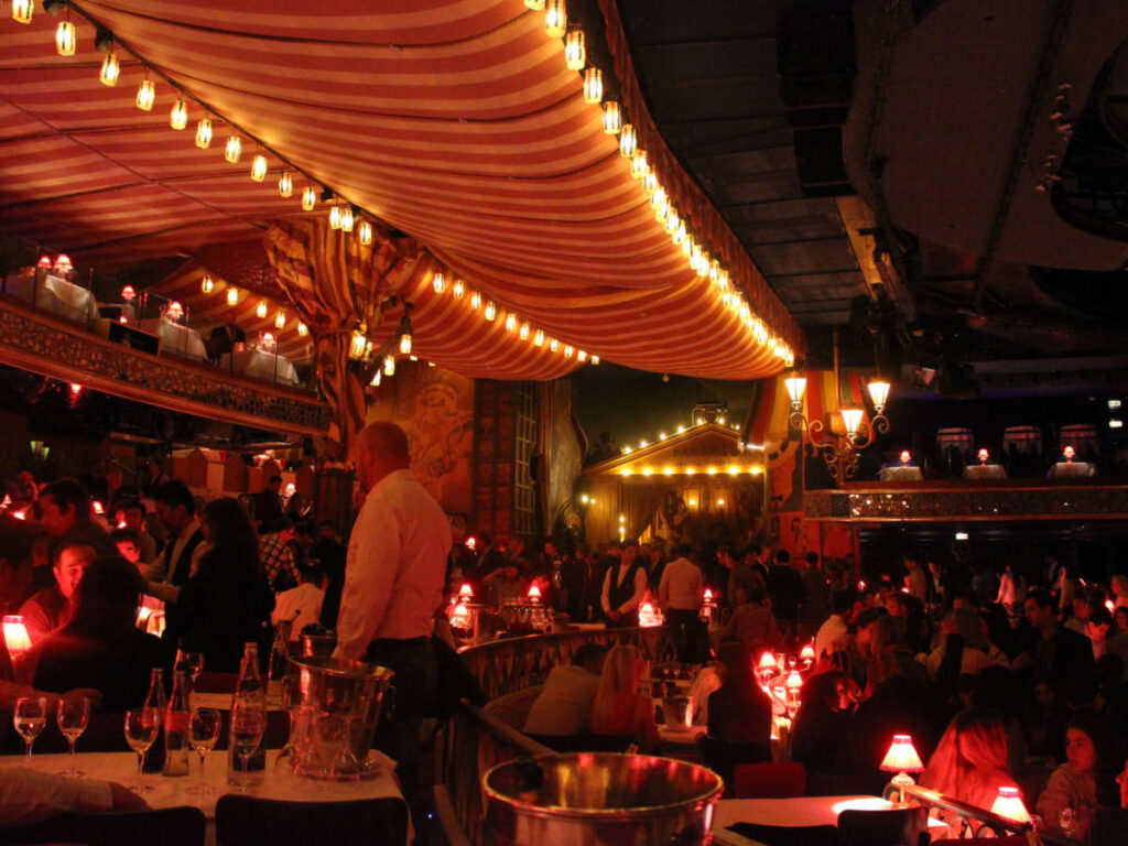View of the people dining and drinking inside The Moulin Rouge