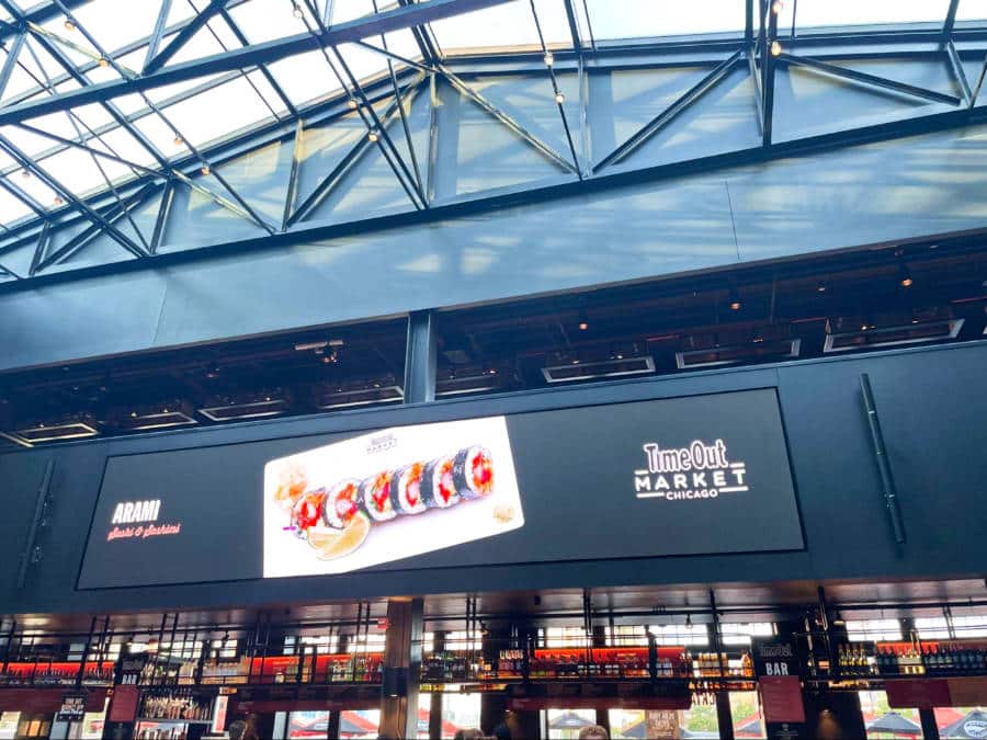 A huge signage with sushi inside the Time Out Market