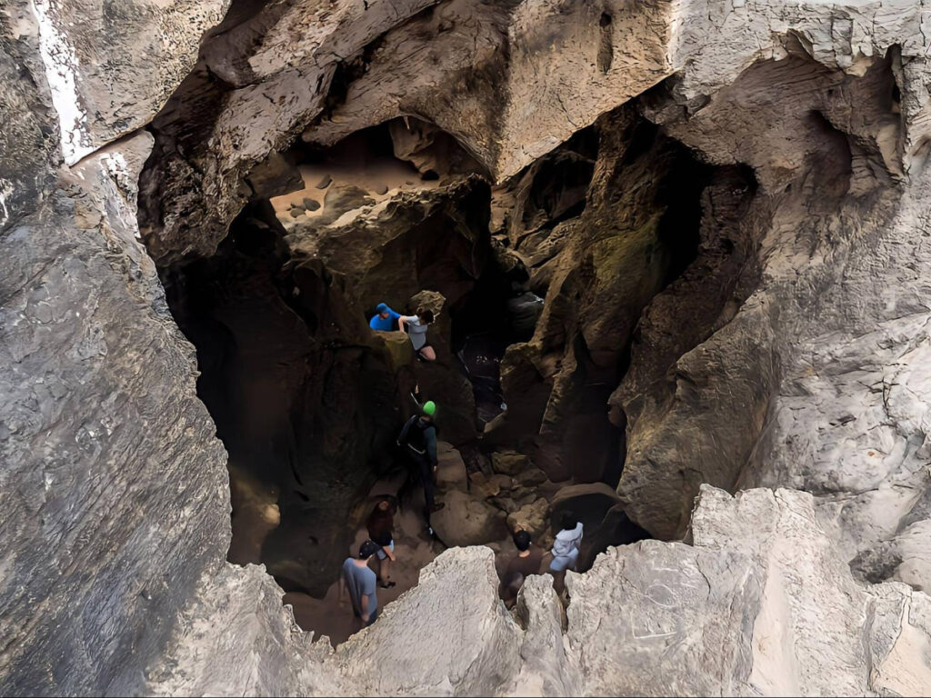 View of tourists inside the Cueva del Indio