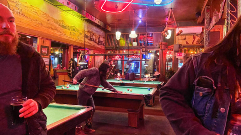 The author, McKenna Mobley playing pool at McMenamins Tavern & Pool