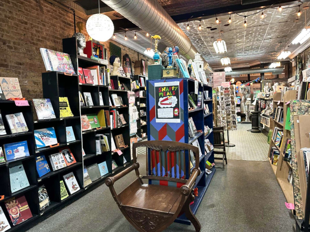 View of the shelves full of books inside the Quimby’s Bookstore
