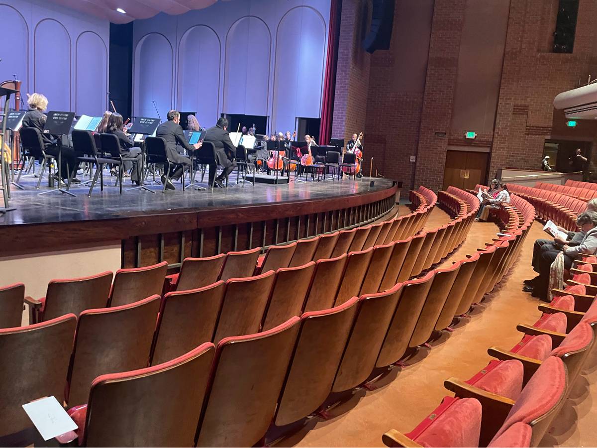 View of the Greeley Philharmonic Orchestra performing inside Union Colony Civic Center