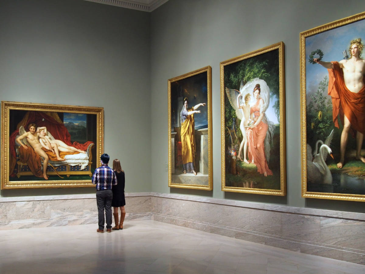A couple admiring a painting in Cleveland Museum of Art