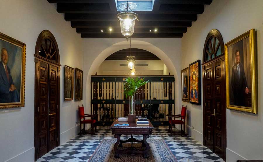 View on a area in La Fortaleza that has portraits on the wall