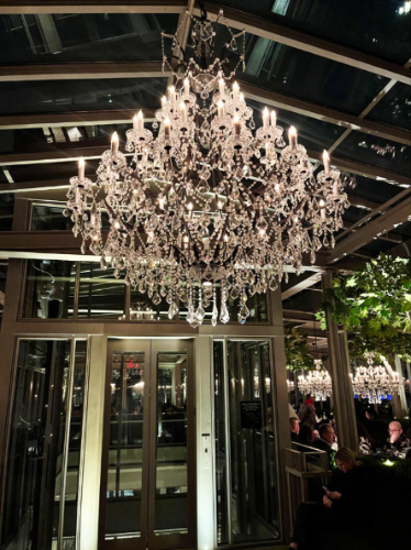 View of the chandelier at the entrance to the RH Rooftop Restaurant