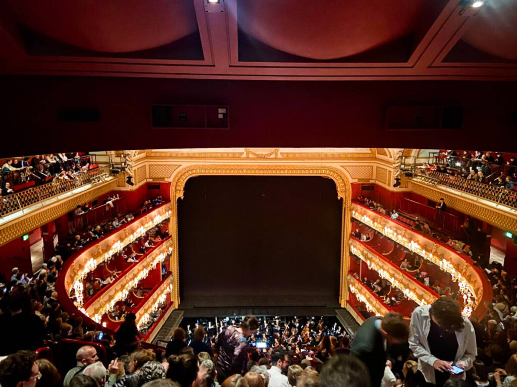 View of the crowd inside the Royal Opera House