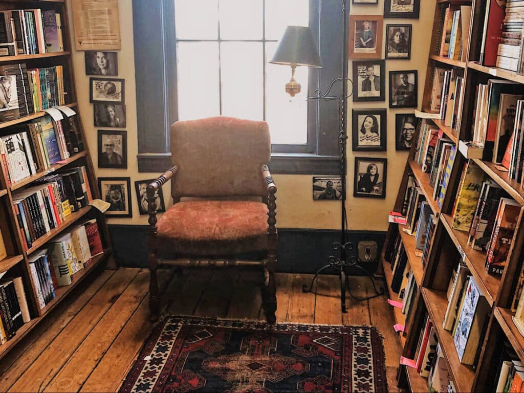 A chair and book shelves inside the Square Books