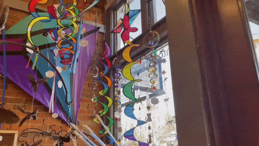 View of the colorful displays moving along the wind at the Into the Wind store