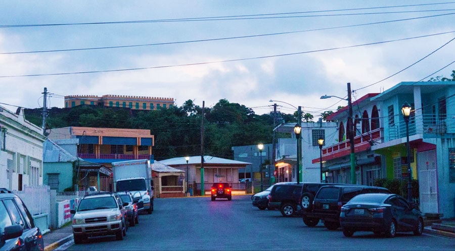 View of cars parked alongside the road of Isabel Segunda