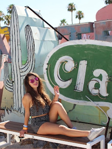 Isabelle Pavese posing for a photo at the Neon Museum