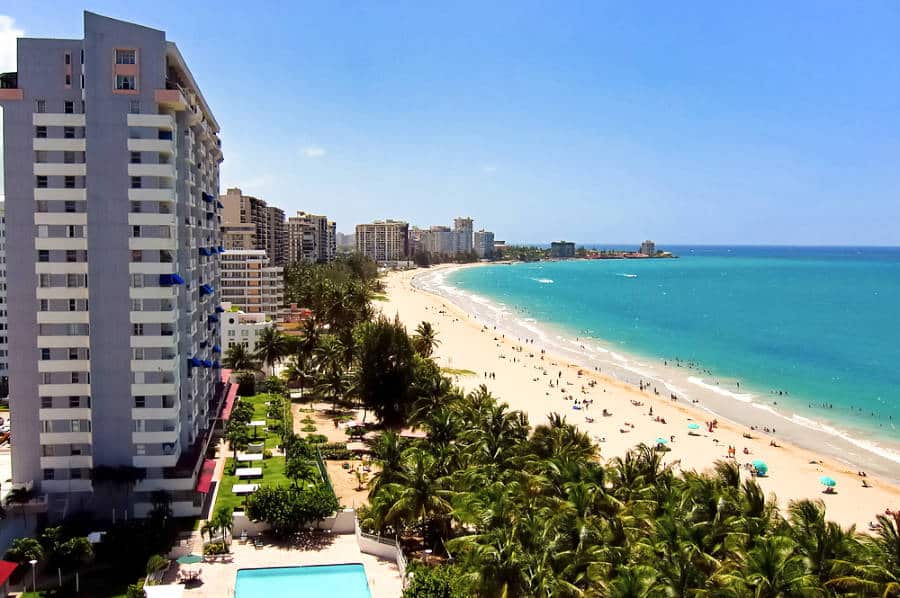 Aerial view of the cityscape with a coastline and waterfront view at Isla Verde