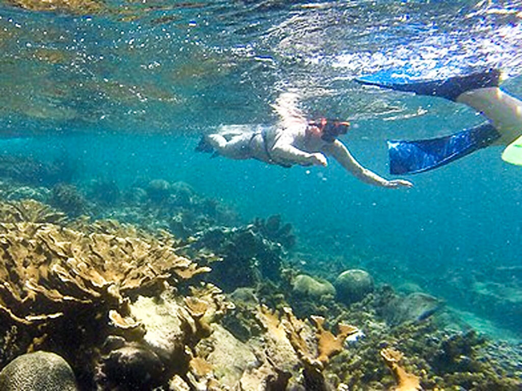 Two people snorkeling in Isla Verde
