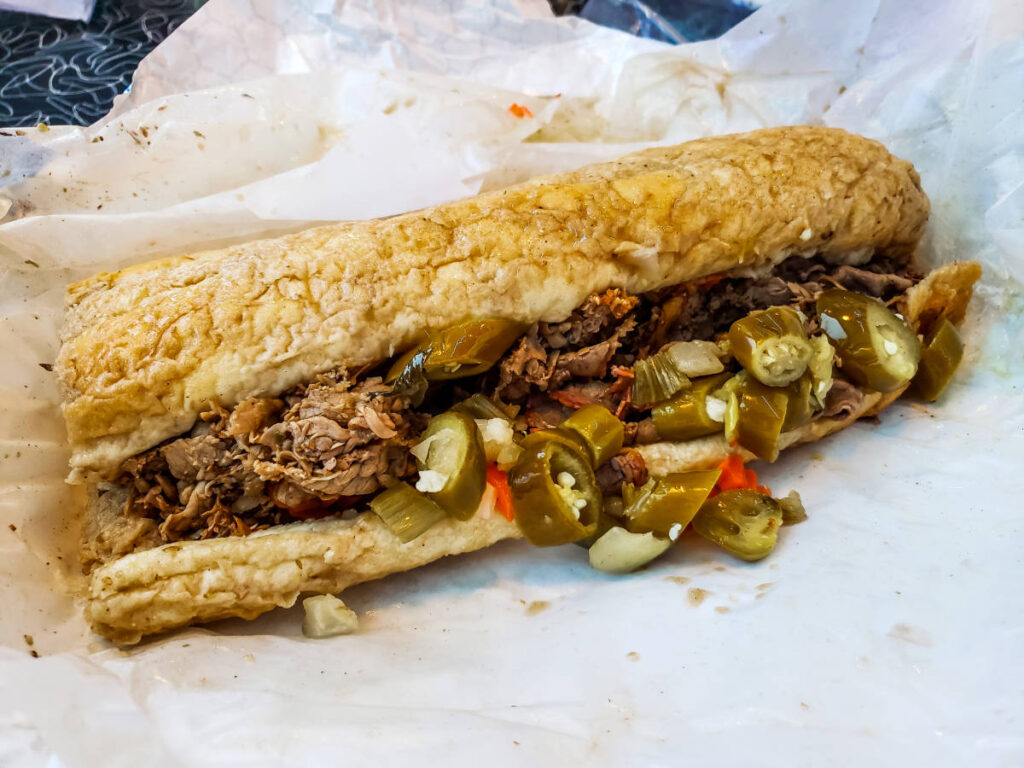 A loaded Chicago-style Italian beef sandwich