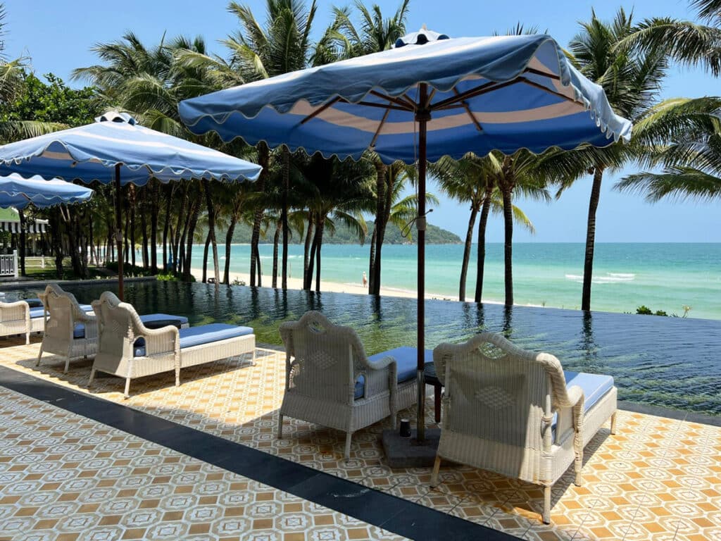 View of the beach from a pool area in JW Marriott Phu Quoc Emerald Bay
