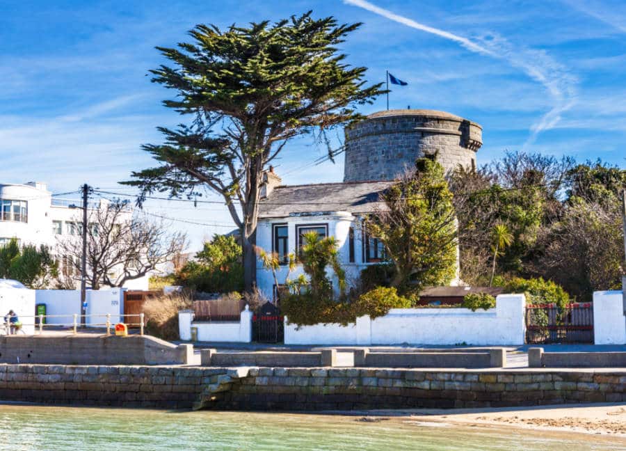 Exterior view of the James Joyce Tower & Museum near the sandycove on a sunny day