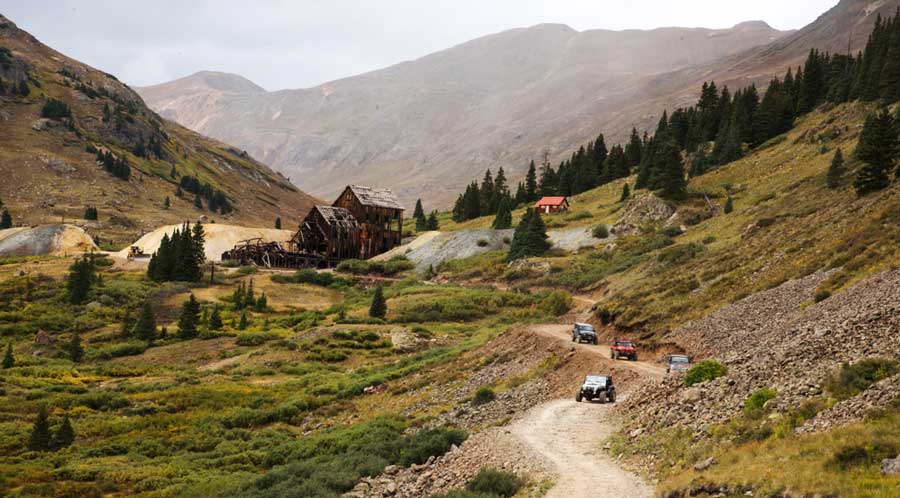 View of jeeps driving along the Alpine Loop in Silverton