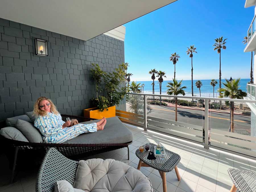 The author sitting on a balcony in Seabird Resort