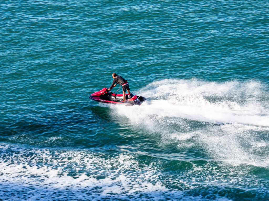 A man riding a jet ski