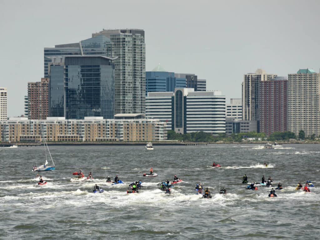People enjoying their day riding a jet ski on the Hudson River