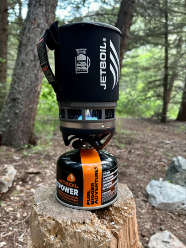 The Jetboil flash cooking system while using it during a backpacking trip