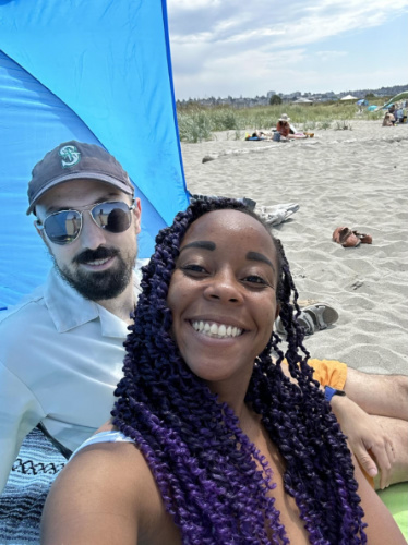 The author Chelsea Booker with her husband at the Jetty Island Beach