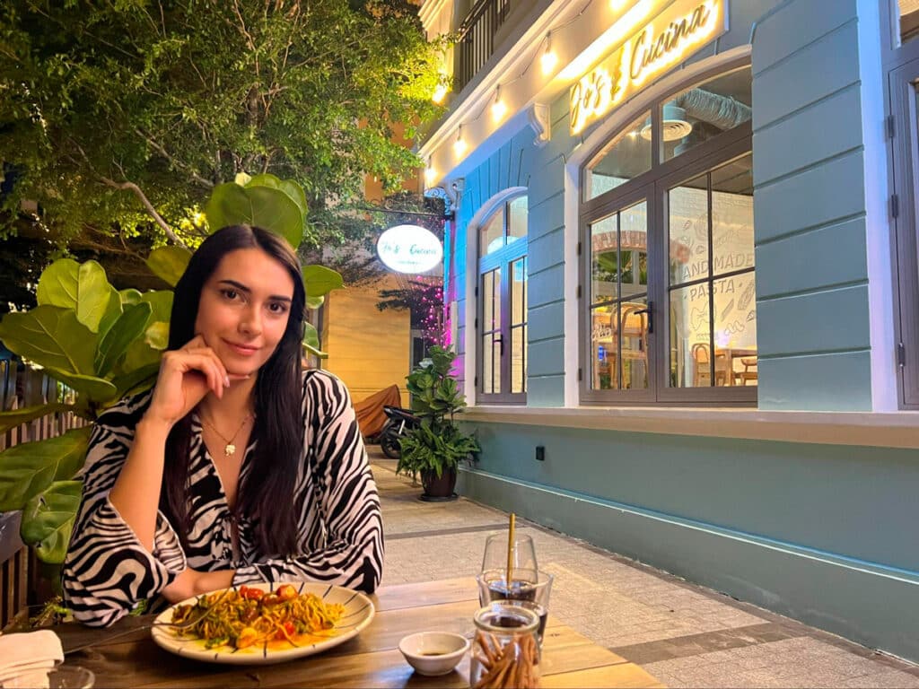 Clara smiling for a photo during their dinner in Jo’s Cucina