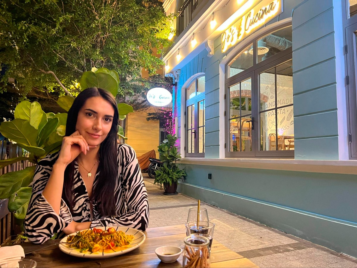 Clara smiling for a photo during their dinner in Jo’s Cucina