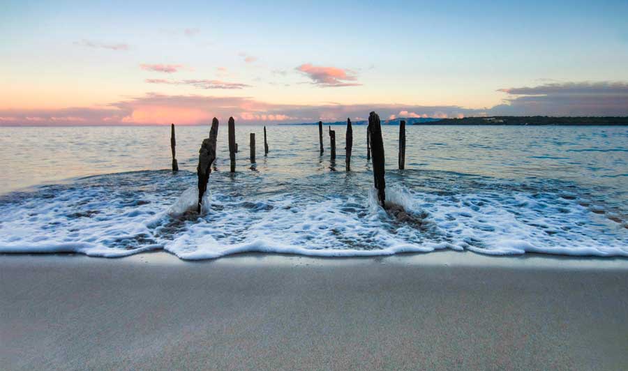 The colorful sky over the Joyuda Beach