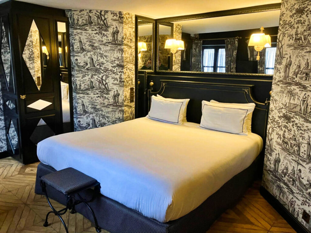 The bed inside the junior suite at the Hôtel JOBO
