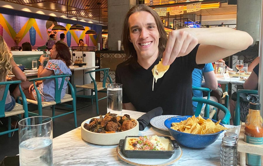 Travel Lemming's founder, Nate enjoying his queso fundido in Kachina Cantina