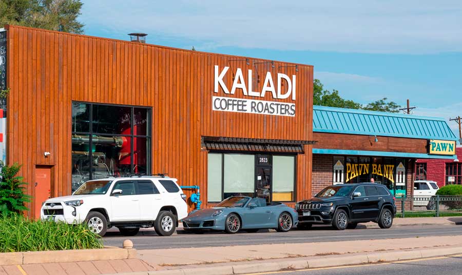 Cars parked in front of Kaladi Coffee Roasters