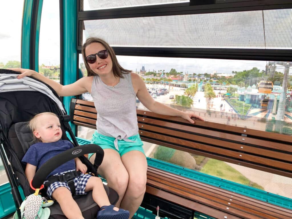 The author Katie Neufeld with her son on a Skyliner in Disney World