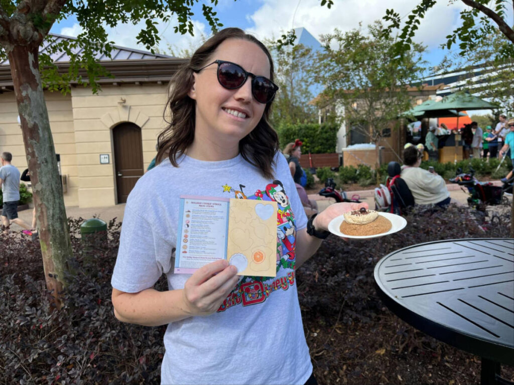 Katie trying out the food at the Festival Food Stands
