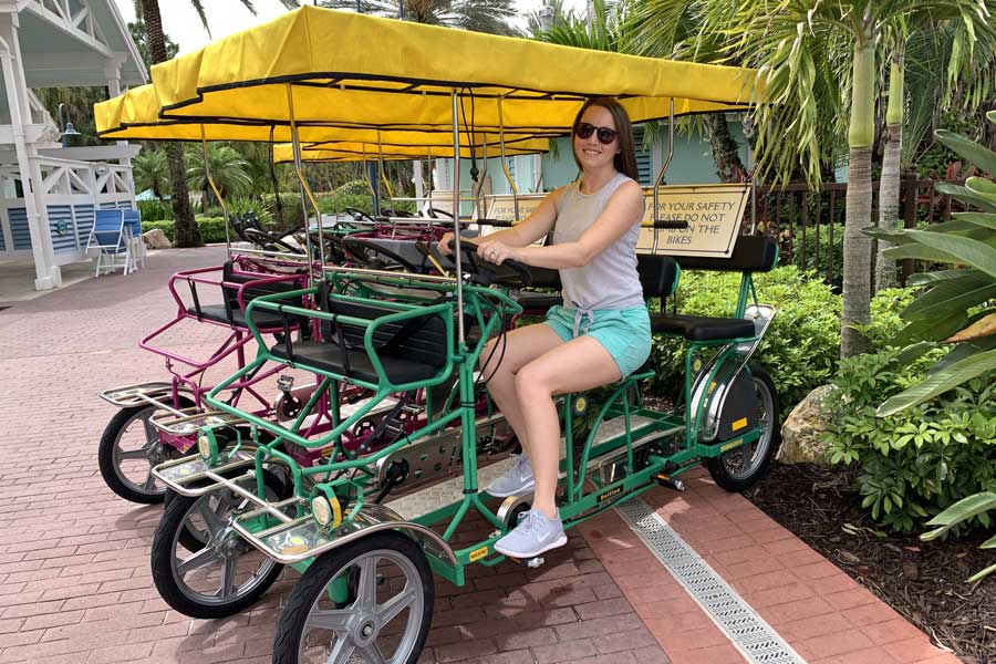 The author riding a bicycle in Disney’s Old Key West Resort
